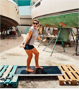 Julia L. on Curacao with her new SOLARA solar panel Vision for her sailing boat. SOLARA Vision glass/glass solar modules are, as you can see, absolutely robust and are lots of fun!